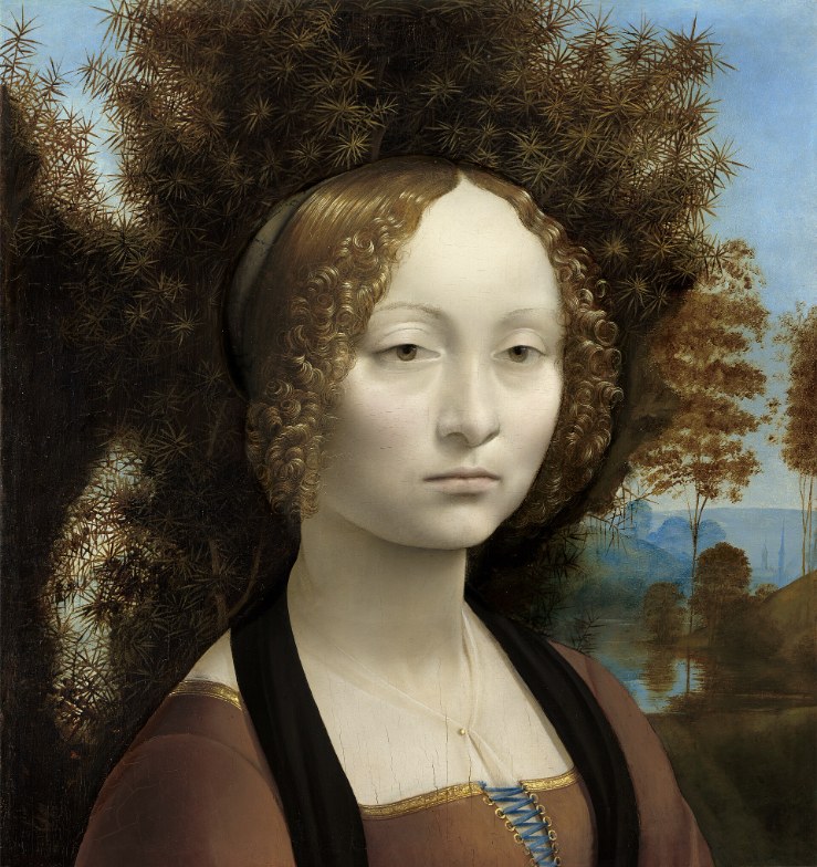Portrait of a pale young woman with tight blonde curls against a dark juniper bush and a blue landscape.